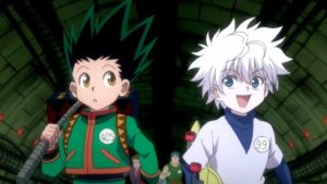 deux personnages de hunter x hunter face à face dans une arène